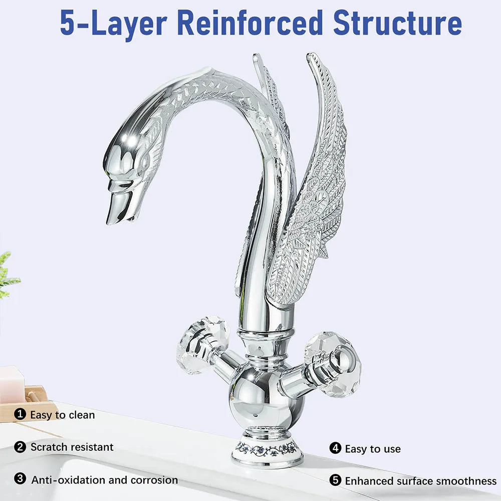 Chrome-finished deck mounted swan faucet with ornate wing detailing and crystal handle for hot and cold water use