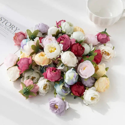 Silk peony flower collection featuring artificial pastel pink lavender white and cream blooms with delicate green stems for decor