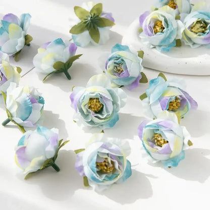 Silk peony flower collection featuring pastel blue lavender and white artificial peonies with yellow centers for decor