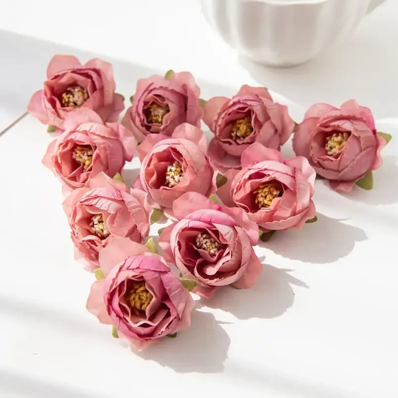 Pink silk peony flower with delicate layered petals and yellow centers for wedding and home decor collection
