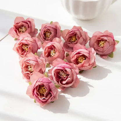Pink silk peony flower with delicate layered petals and yellow centers for wedding and home decor collection