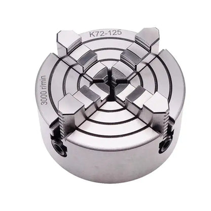 Silver 4 jaw metal lathe chuck decorbites 125mm with circular design and four angular jaws for workshop use