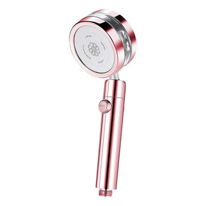 Rose gold handheld shower head with sleek cylindrical handle and floral engraved head in silver and purple double panel turbo design