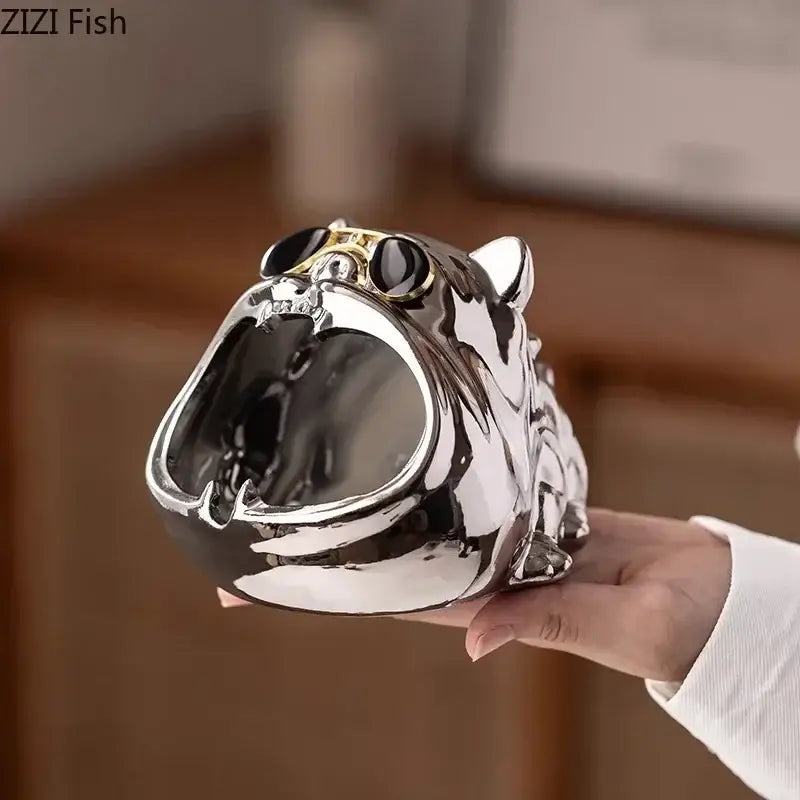Silver bulldog ceramic ashtray shaped like a shiny black and silver tiger with gold-trimmed eyes for living room use