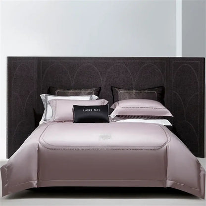 A soft lavender cotton satin jacquard bedding set with silver-threaded trim and subtle embroidery for bedroom decorbites