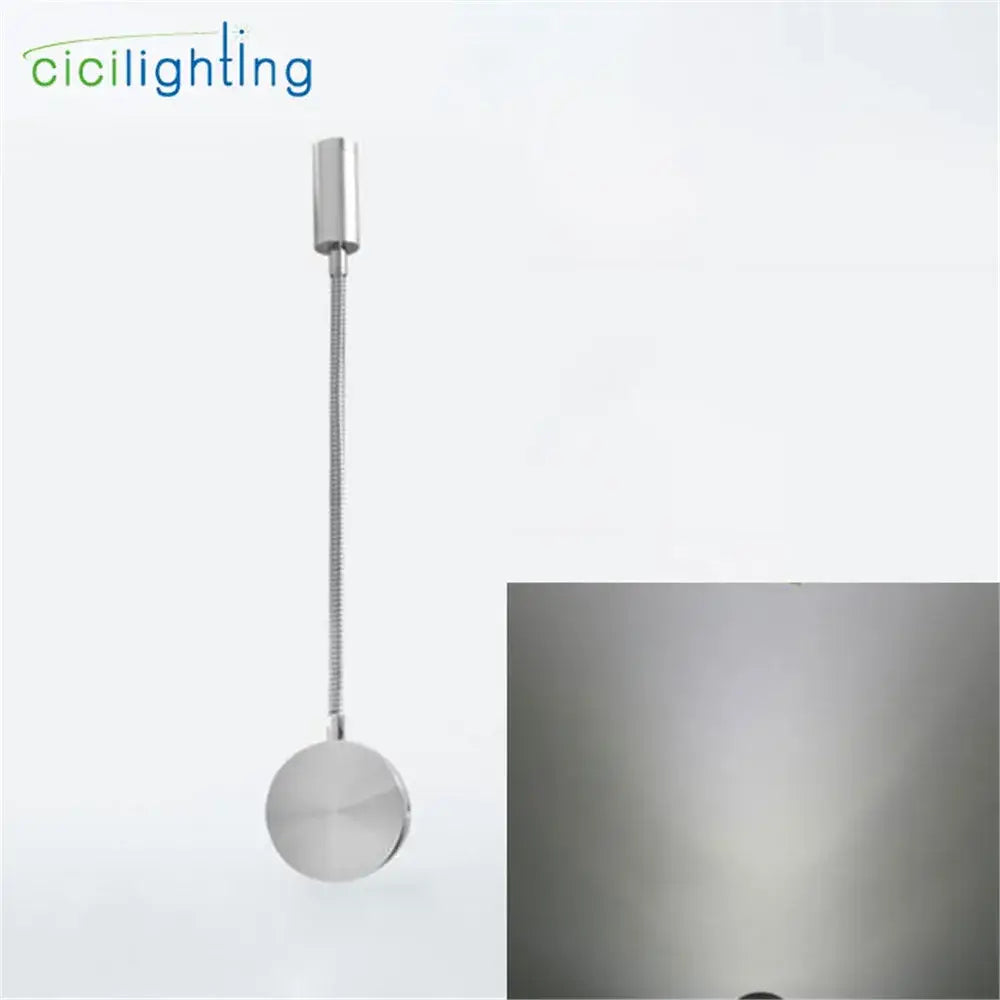 Silver flexible gooseneck LED wall sconce with metallic finish and circular base for bedroom reading decorbites 3w flexible