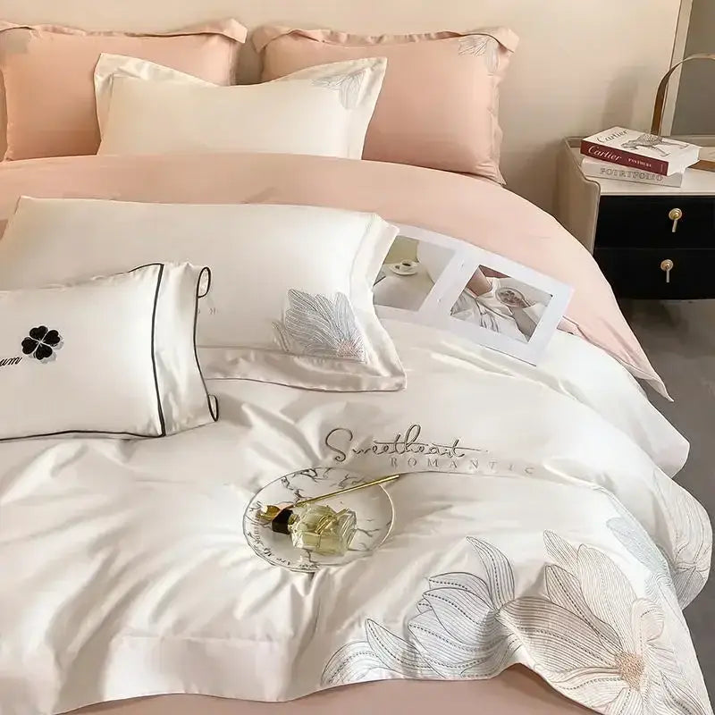 White satin duvet cover with silver floral embroidery and sweetheart stitching in decorbites cotton king size bedding set