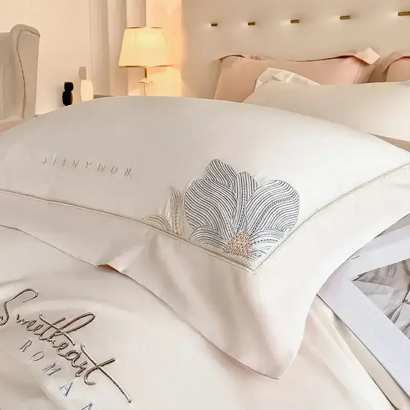 White satin pillowcase with elegant silver and rose gold floral embroidery in decorbites cotton king size bedding set