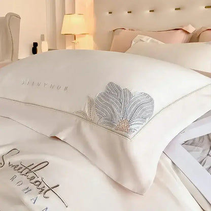 White satin pillowcase with elegant silver and rose gold floral embroidery in decorbites cotton king size bedding set