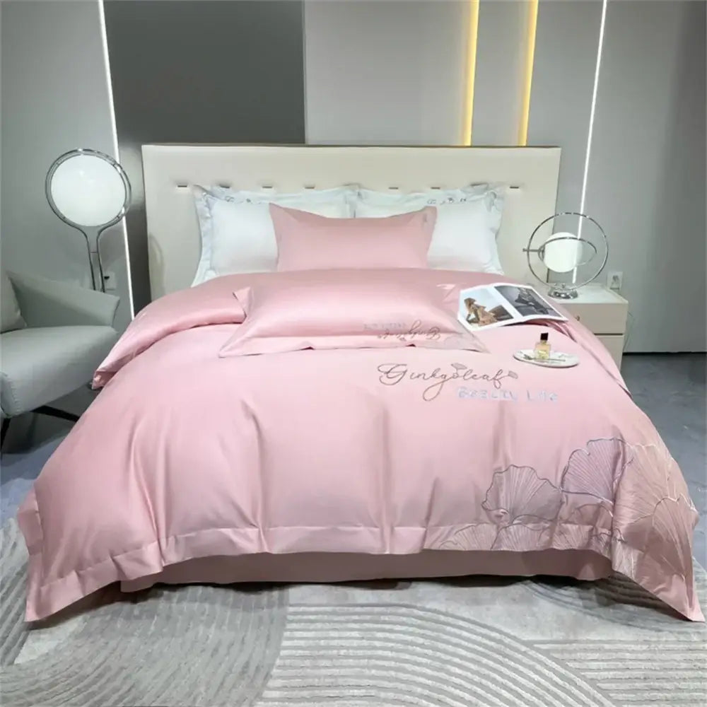 Pink satin duvet cover set with embroidered ginkgo leaf and script design in decorbites 1200tc embroidery egyptian cotton bedding set