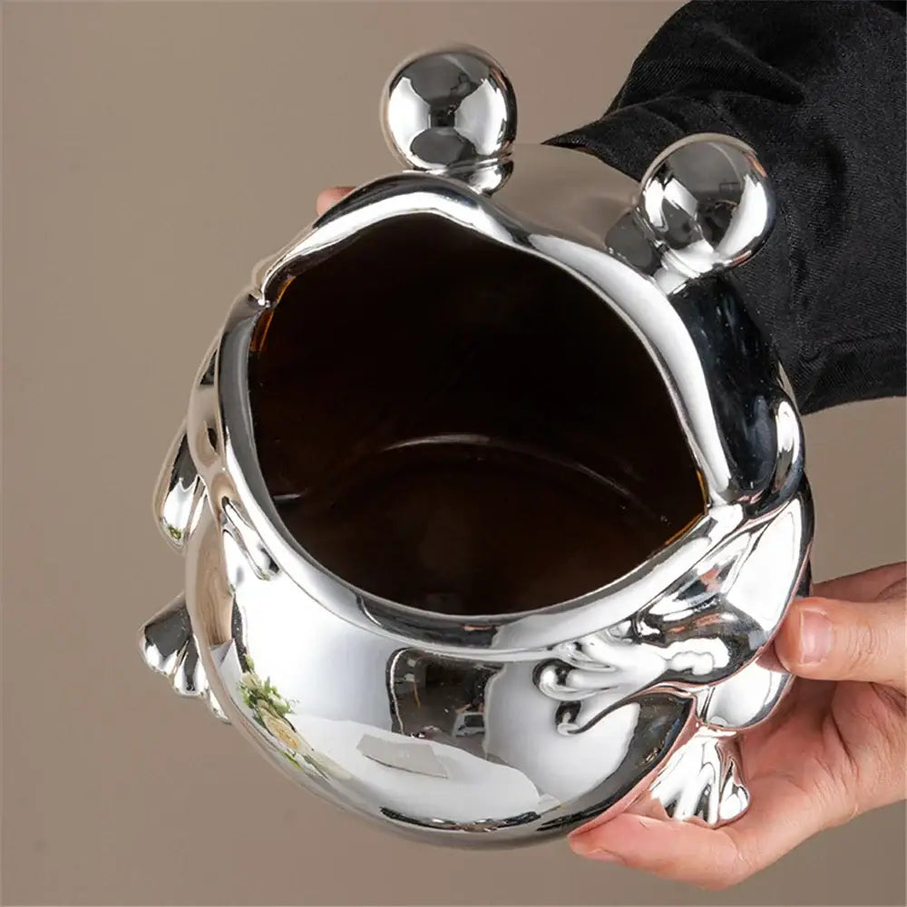 Silver green ceramic frog sculpture storage box with shiny chrome finish and detailed limbs for living room decor