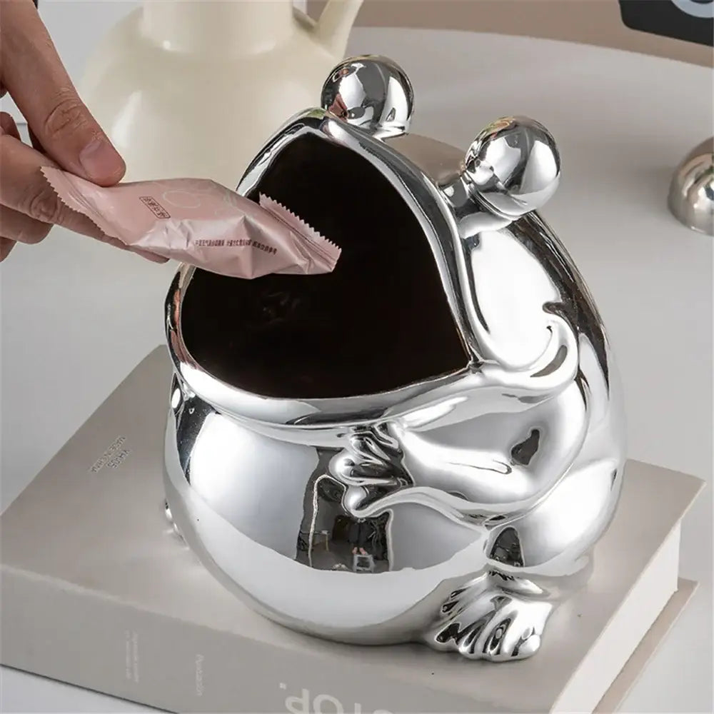 Shiny silver ceramic frog sculpture storage box with open mouth design for living room decor and candy storage