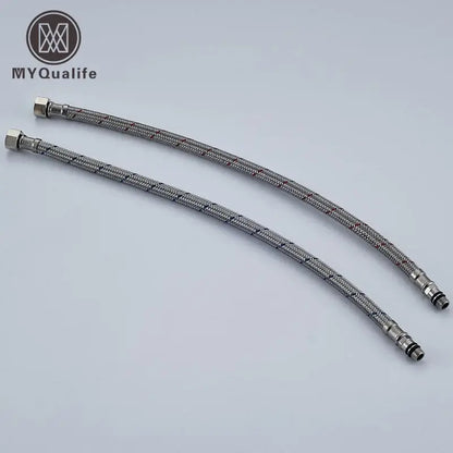 Two silver stainless steel plumbing hoses with braided texture and threaded connectors for steel faucet plumbing use