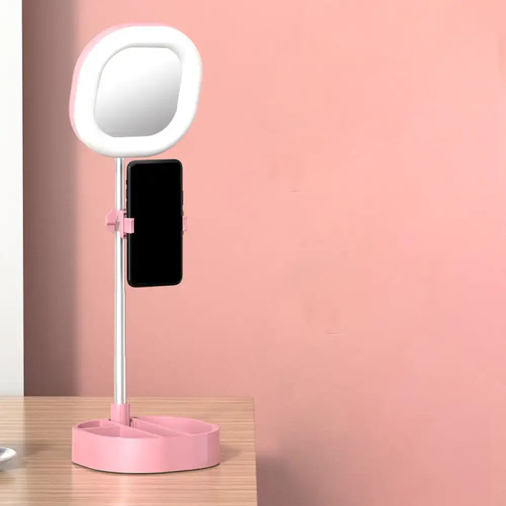 Pink and white ring light vanity mirror with phone holder featuring led mirror light for bedroom vanity use