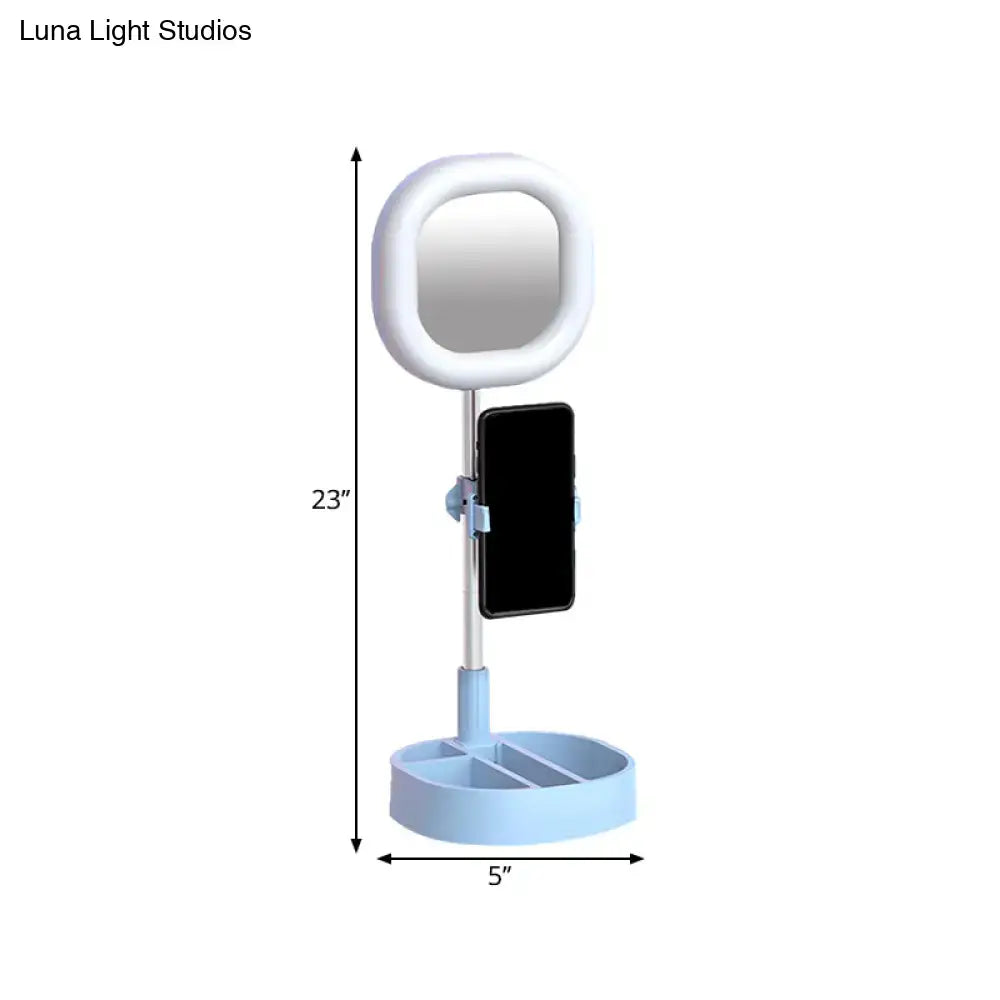 Light blue plastic vanity led mirror light with circular ring light and phone holder for bedroom use