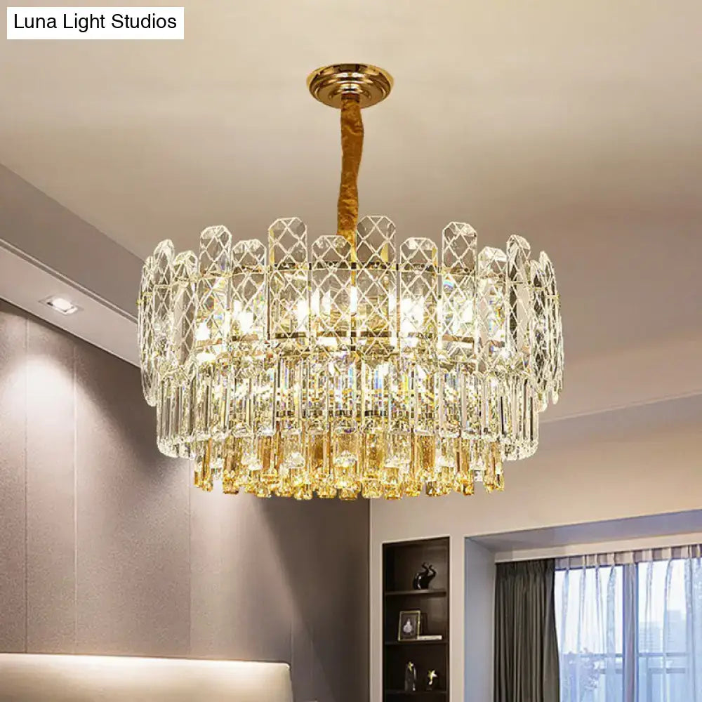 Decorbites rectangular drum crystal chandelier with 9 bulbs features a luxurious gold tone and clear and amber prisms in simple style light type