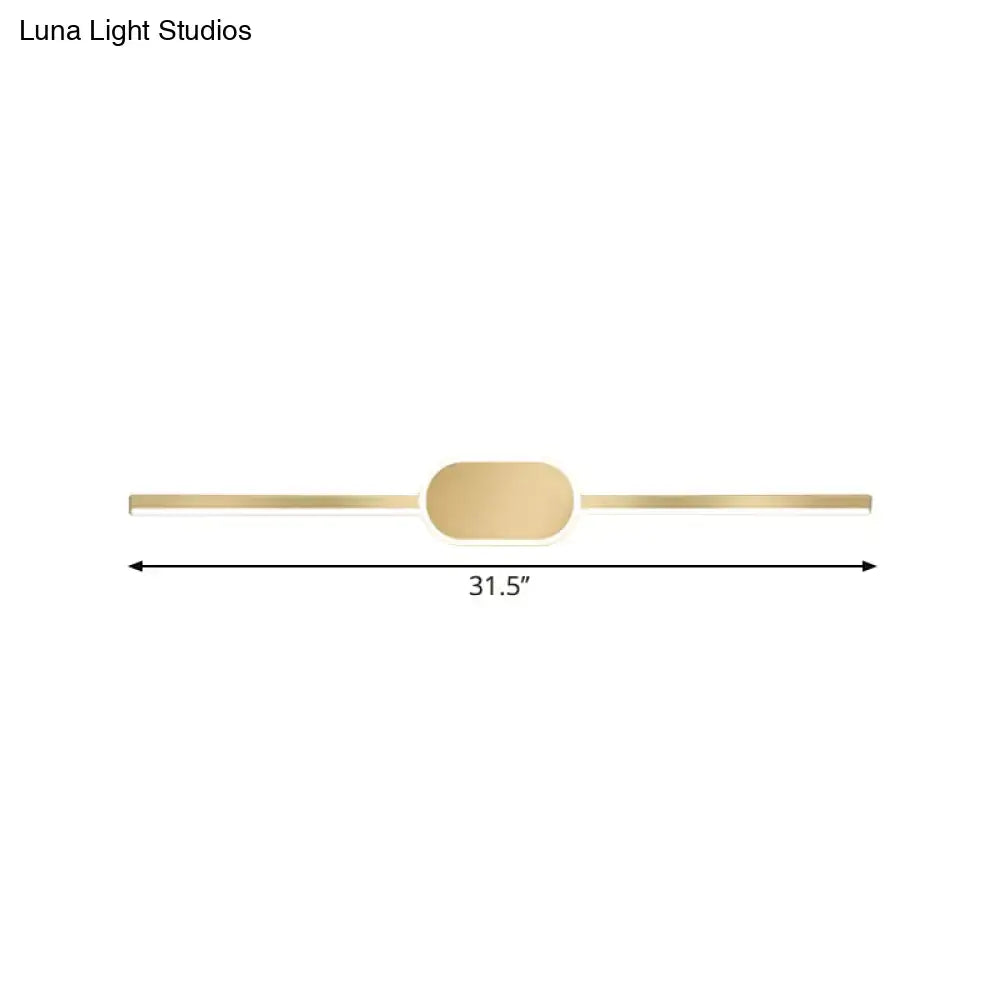 Gold-toned simple style vanity sconce with a sleek rectangular design and central oval accent wall mounted LED light
