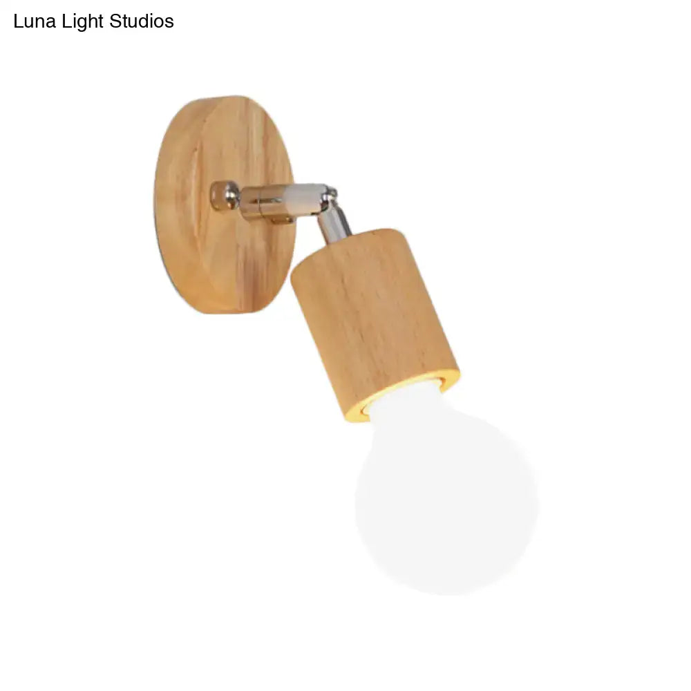 Minimalist wall-mounted open bulb mini rotating sconce with natural wood finish and chrome accents for bedroom lighting
