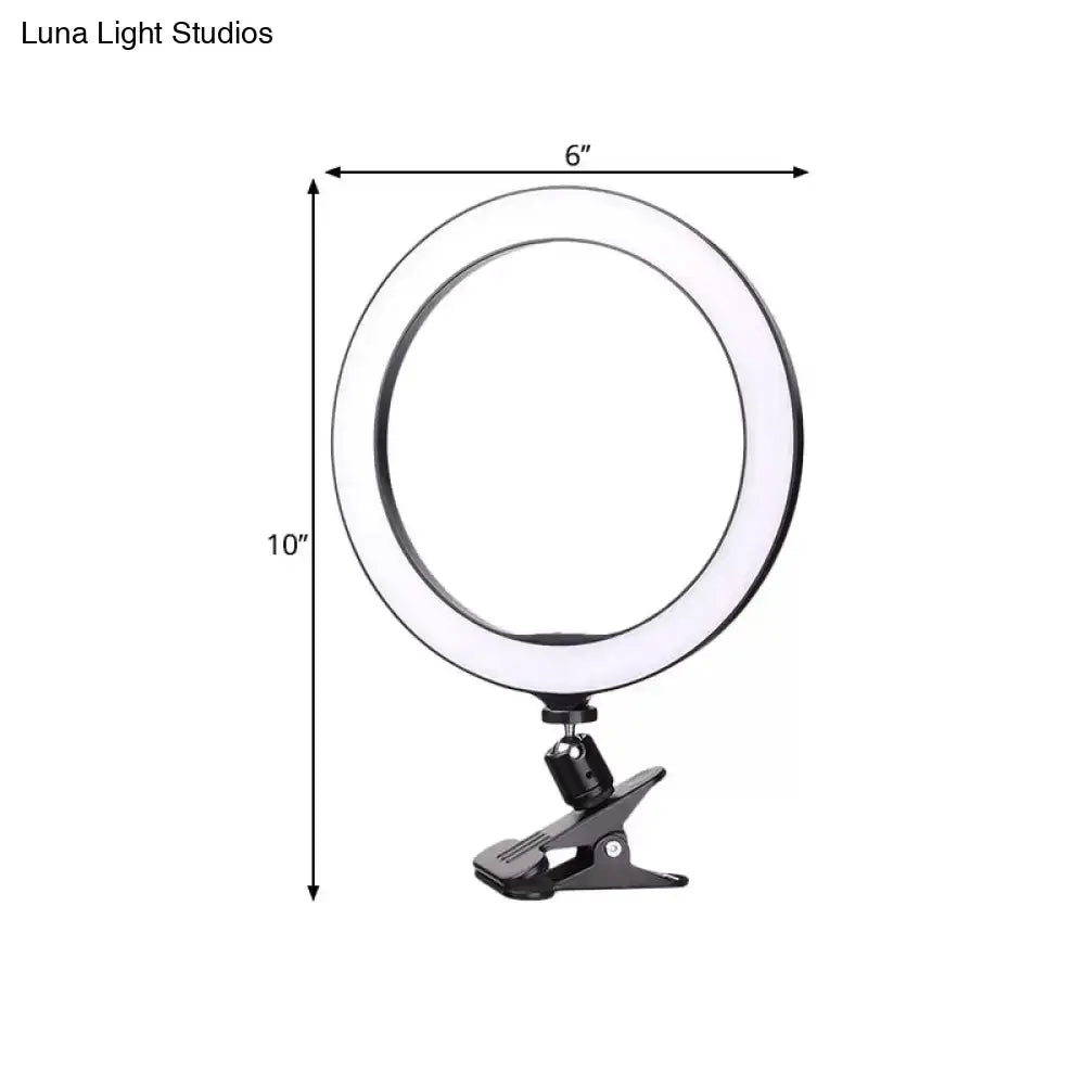 Sleek black led ring wall light with 6 inch fixture height and bright white color temperature for bedroom clip on use