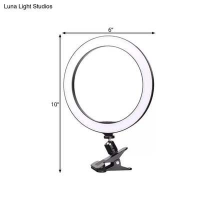 Sleek black led ring wall light with 6 inch fixture height and bright white color temperature for bedroom clip on use