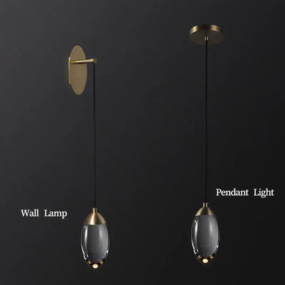 Sleek brass and crystal led wall light with translucent gray glass shades for bedroom and living room decorbites crystal led