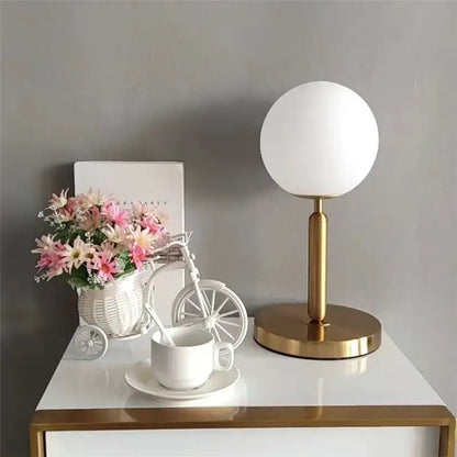 Sleek brass glass ball table lamp with frosted white glass ball shade for bedroom decorbites glass ball table lamp