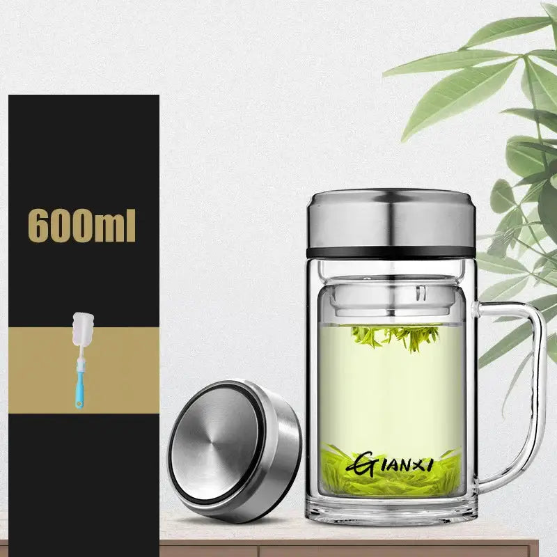 Clear double-walled glass water bottle with stainless steel lid and handle featuring gianxi brand name etched on side