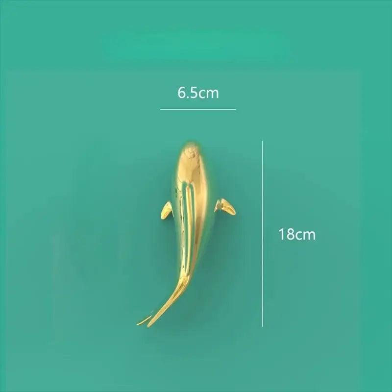 Golden metallic fish-shaped decorbites goldfish resin wall hanging measuring 18cm long and 6.5cm wide for living room decor