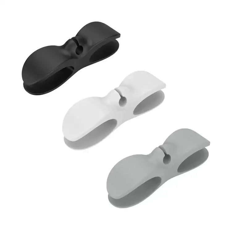 Set of three sleek silicone decorbites cord winder cable organizers in black white and gray for kitchen use