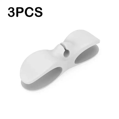 White silicone decorbites cord winder cable organizer with smooth flexible design and two curved slots for cables
