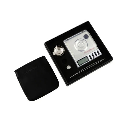 Silver decorbites digital milligram gram scale with clear cover black buttons and matching black carrying case for precision use