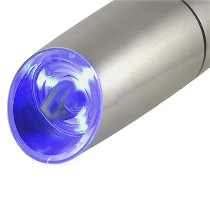 Sleek silver electric pepper and salt grinder set featuring a cylindrical led light with a translucent blue lens