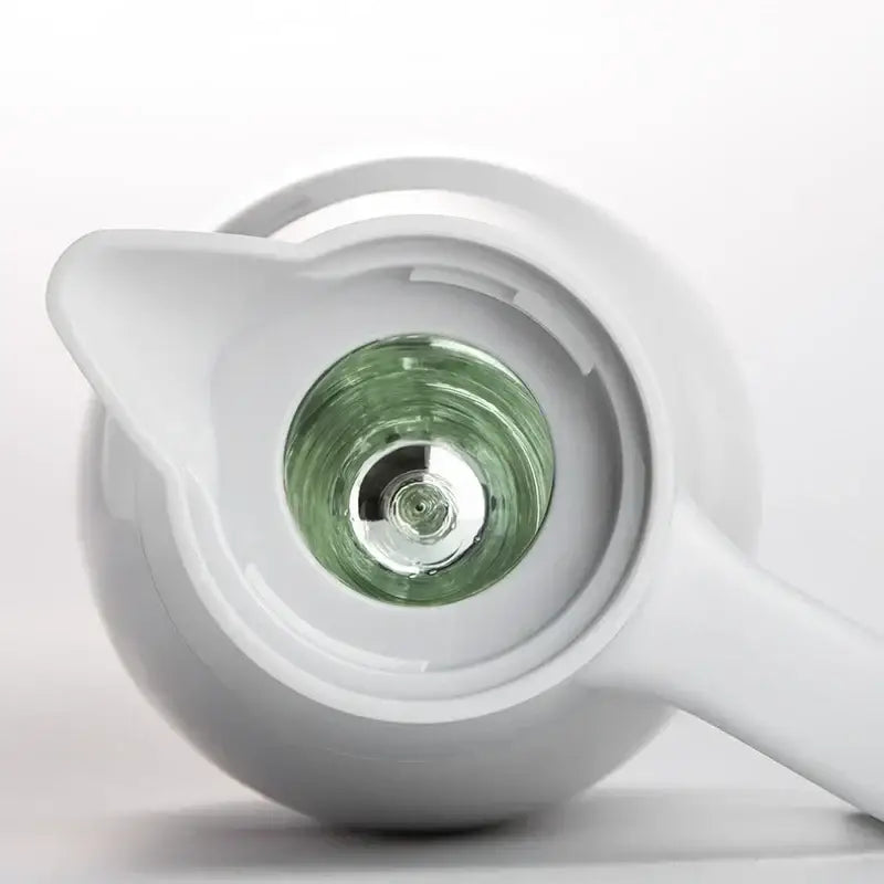 White ceramic teapot with translucent green glass chamber paired with sleek silver stainless steel decorbites insulavacuum bottle