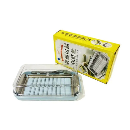 Sleek white and stainless steel decorbites butter slicer with clear lid and integrated cutting board for easy slicing