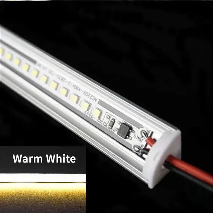 Slim white v type led corner strip lights with silver casing and warm white illumination for kitchen cabinets