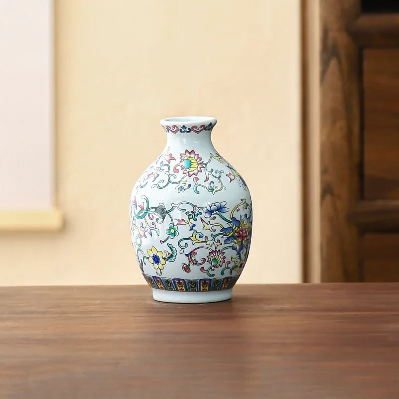 Small ceramic vase with delicate white porcelain and colorful floral enamel glaze for elegant vintage Chinese decor