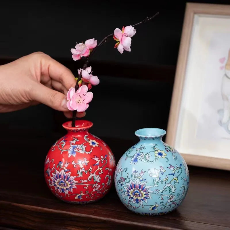 Small ceramic vase set featuring vibrant red and light blue enamel glazed porcelain with vintage Chinese floral patterns