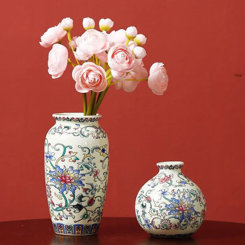 A tall cream-colored ceramic vase with blue and pink floral patterns for elegant vintage Chinese painting decor