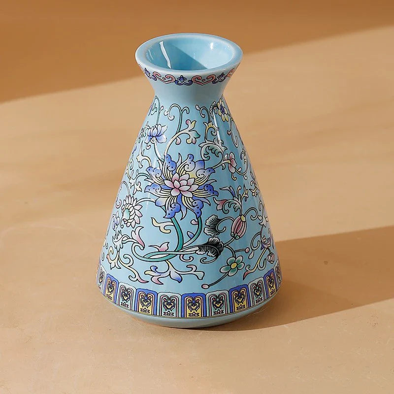 Small ceramic vase in light blue enamel glazed porcelain with vintage Chinese floral and vine patterns for home decor