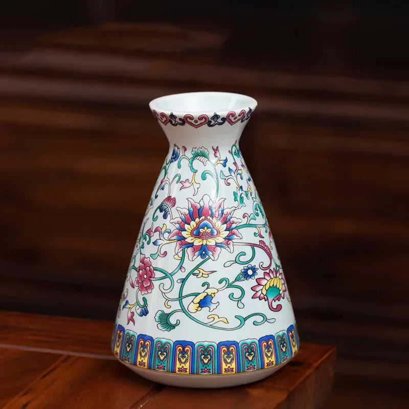 Small white ceramic vase with hand-painted vintage Chinese floral patterns in pink blue green and yellow for home decor