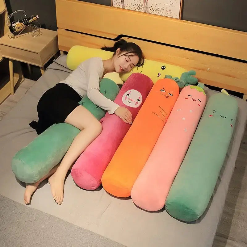 A collection of colorful plush vegetable-shaped decorbites cylindrical long pillows with cute cartoon faces