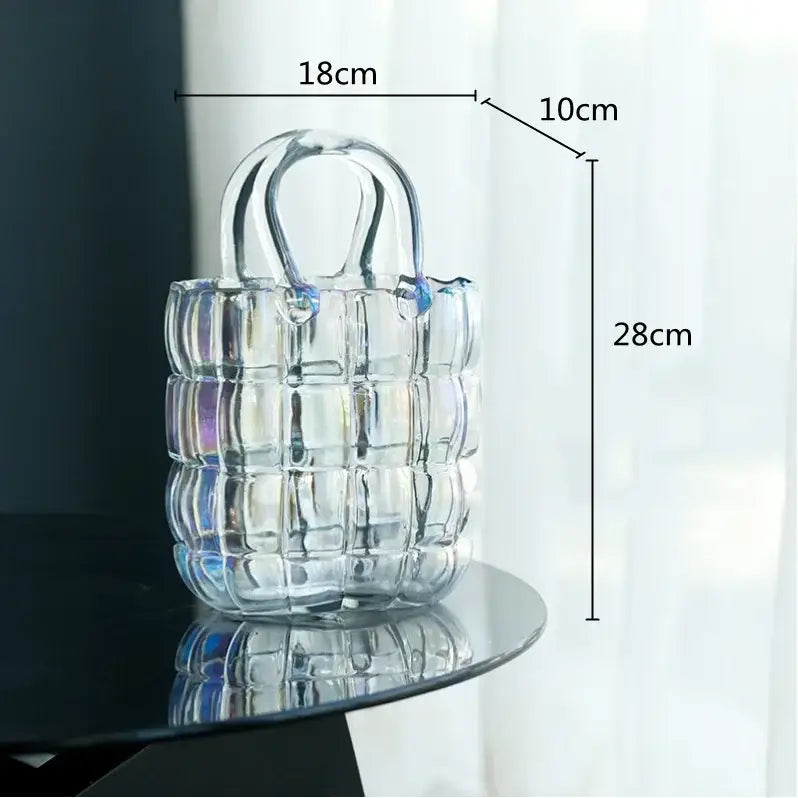 Clear glass handbag with geometric quilted design and curved handles featured in smoky gray amber decorbites clear glass vase collection