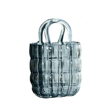 Transparent blue tinted glass tote bag with quilted pattern and curved handles for decorbites clear glass vase decor