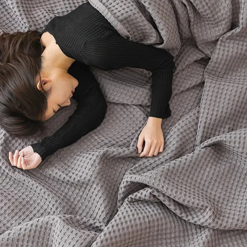 Gray waffle-weave blanket made of soft cotton honeycomb towel fabric for living room couch decorbites cotton honeycomb