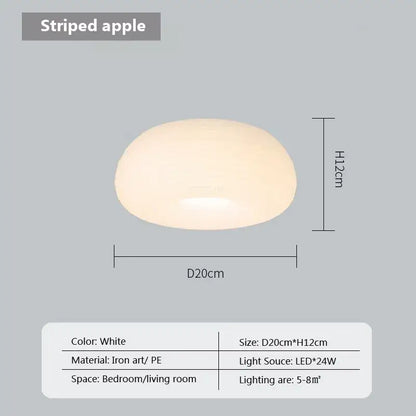 White oval-shaped decorbites cream apple pendant light with a frosted finish and vertical striping for bedroom decor