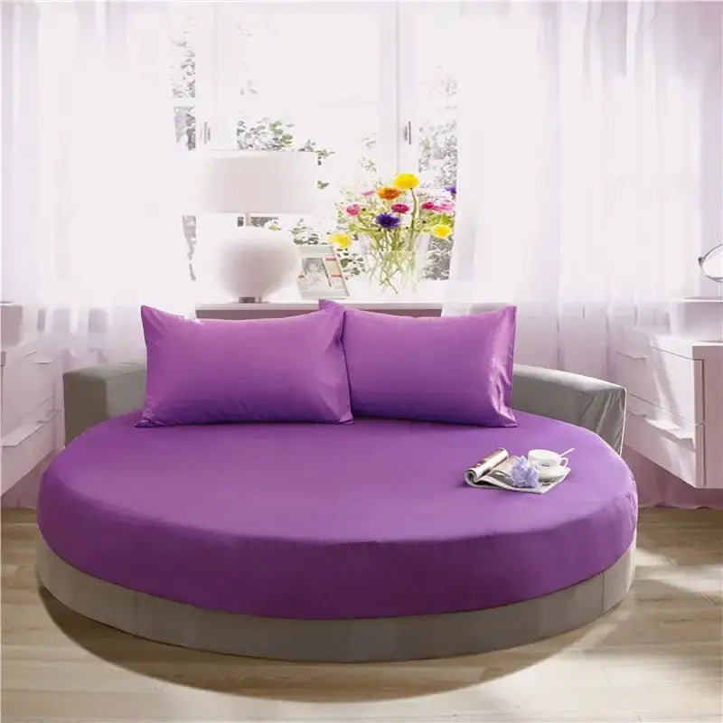 Soft dark gray cotton round bed sheet set on purple round bed with matching pillows and gray base for decorbites cotton round use