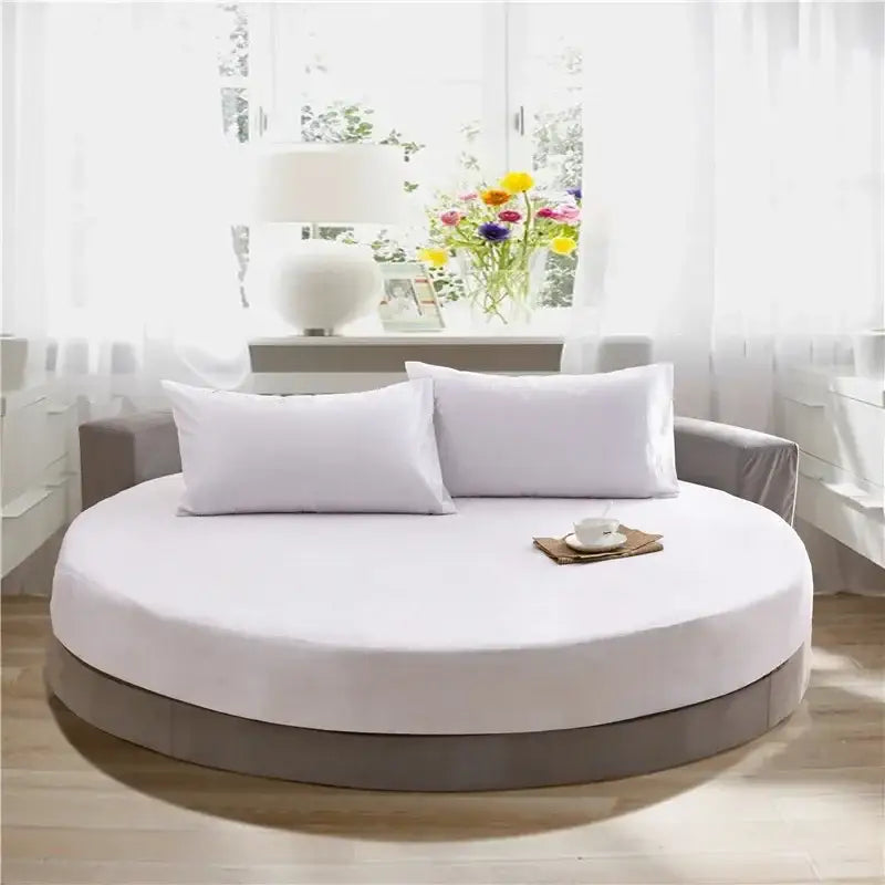 Soft dark gray cotton round bed sheet set on round bed with white mattress and matching pillows for decorbites cotton round use