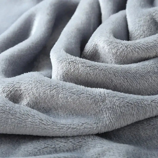 Soft gray plush flannel warm blanket with cozy textured surface perfect for decorbites cozy flannel bedroom use