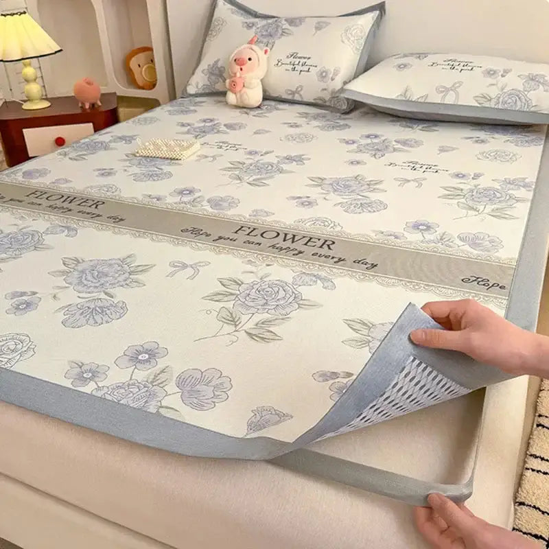 Soft gray floral antibacterial pattern mattress set featuring a light blue cooling pad with gray border and embroidery