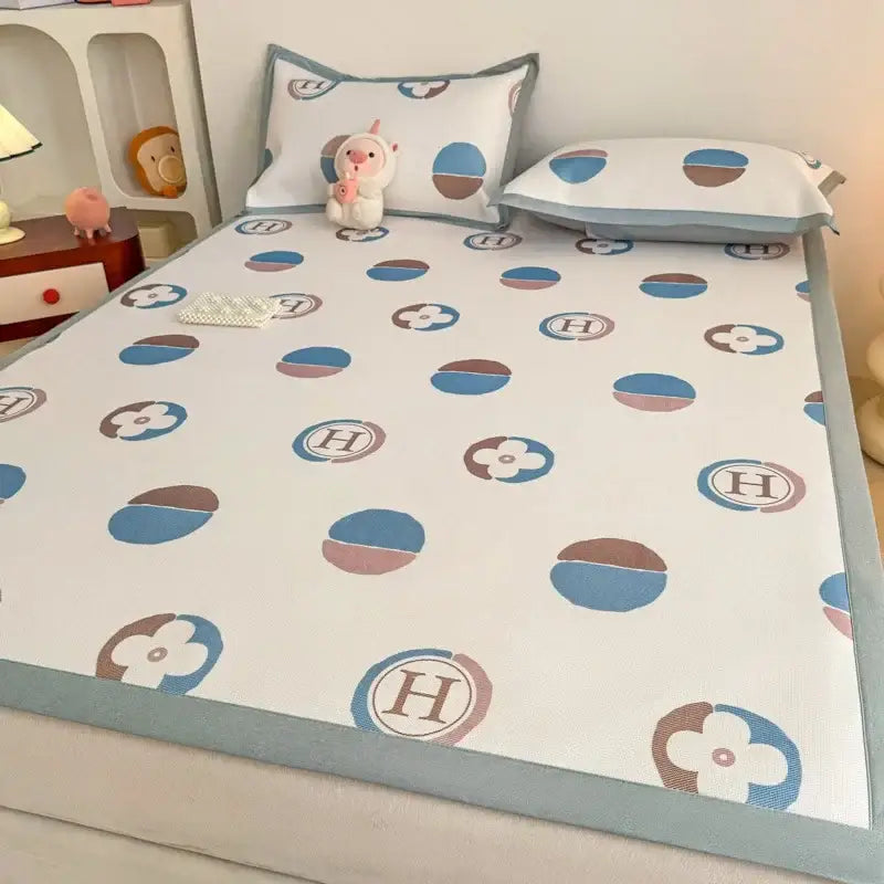 Soft gray floral antibacterial pattern mattress set featuring white cooling mattress pad with blue and brown decorative motifs